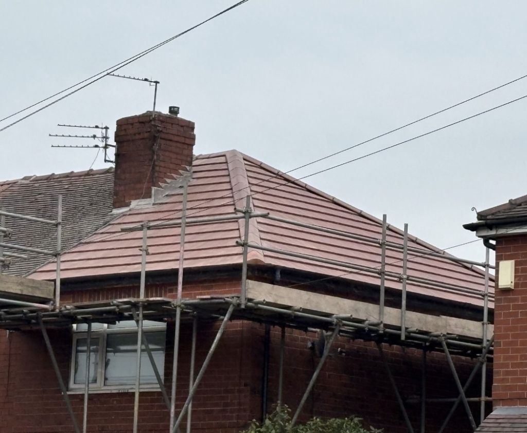 Red concrete tile roof upgrades on semi-detached — After