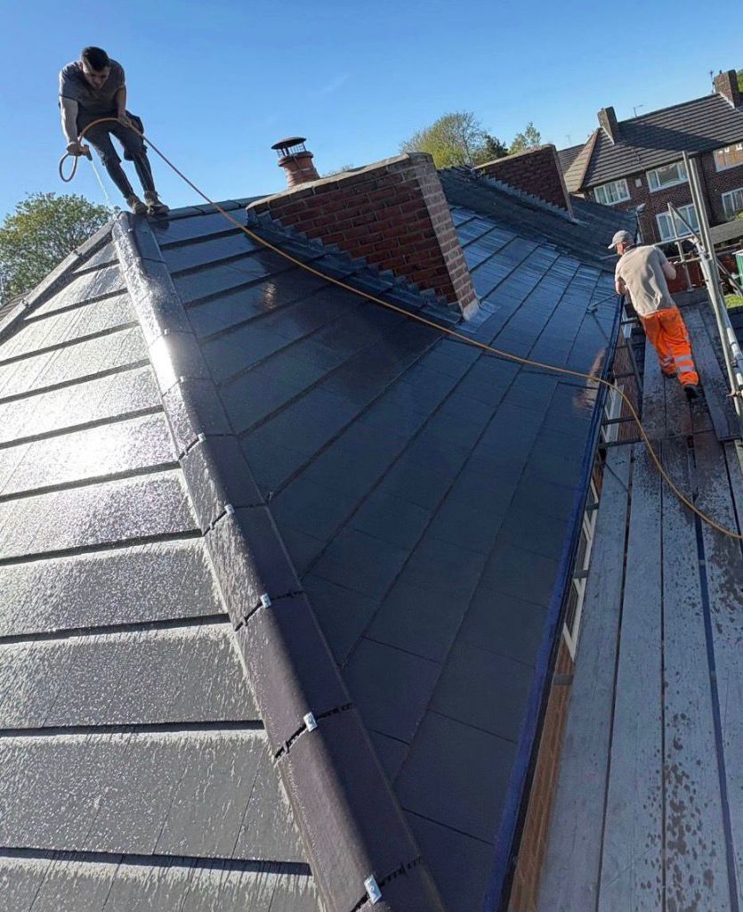 Grey tile roof re-roof with ridge repairs — After
