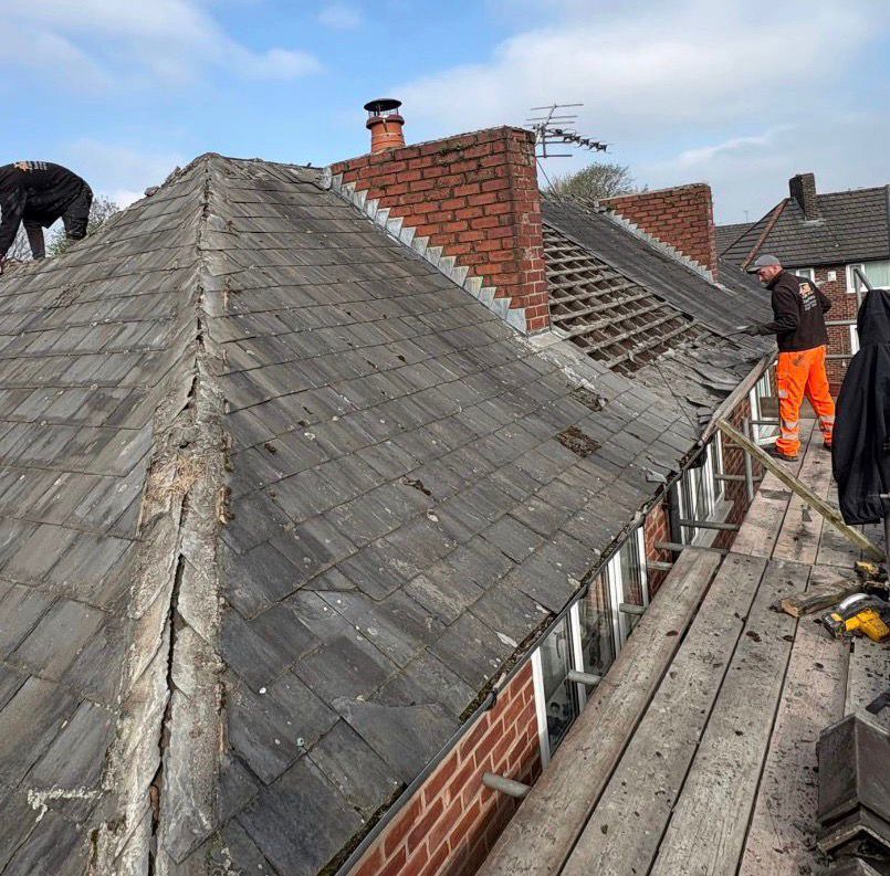 Grey slate roof replacement – two-story detached — Before