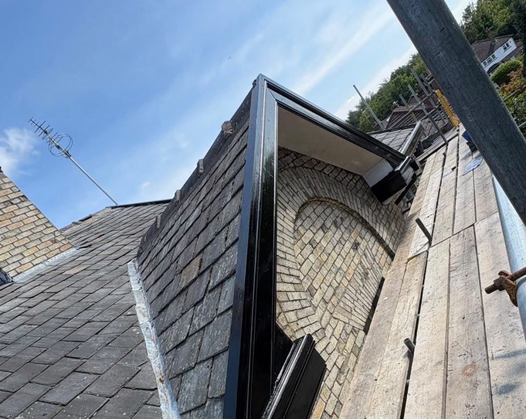 Apartment block roofline restoration — After