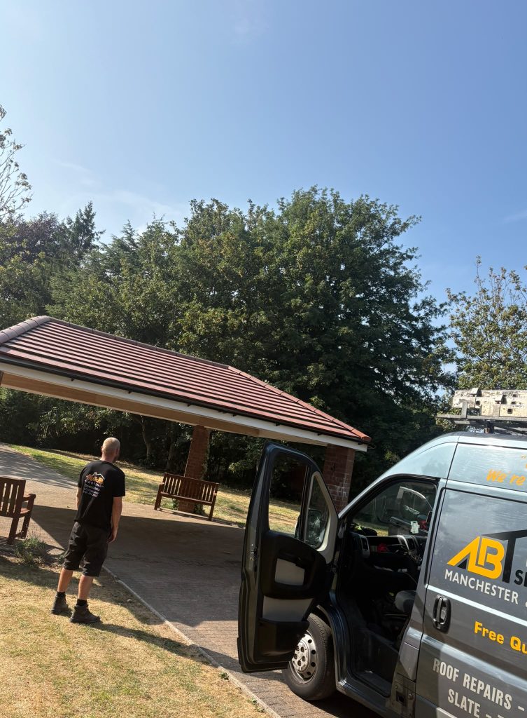 Community shelter new roof installation — After