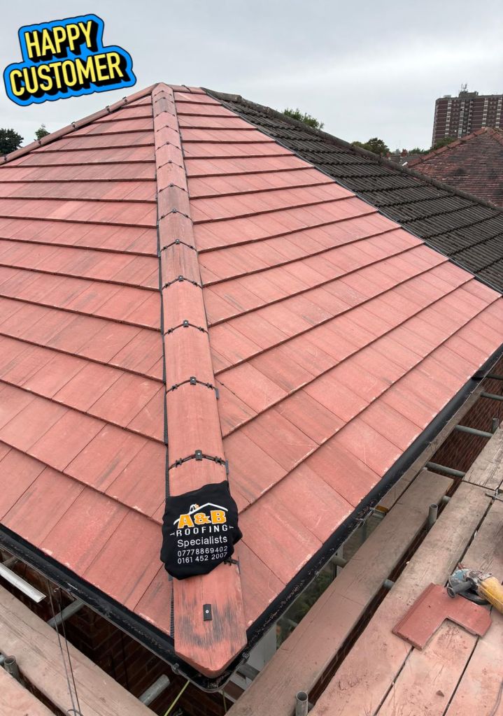 Full re-roof with Old English red tiles — Completed roof