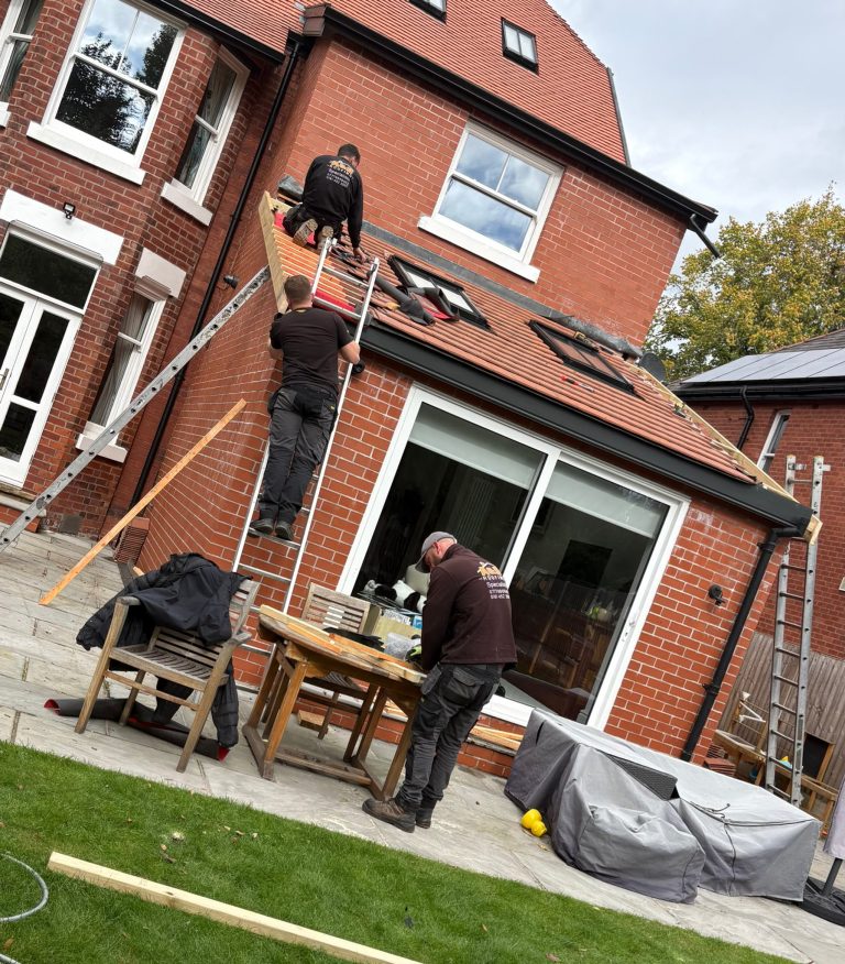 Rear extension roof tiling in progress